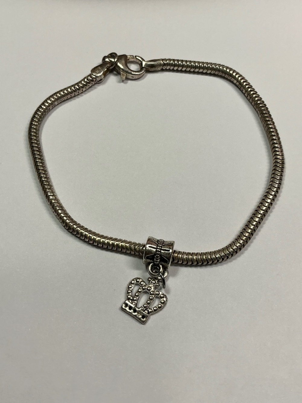 RCI Sterling Silver Snake Chain Bracelet W/ Crown Charm. 8” long
